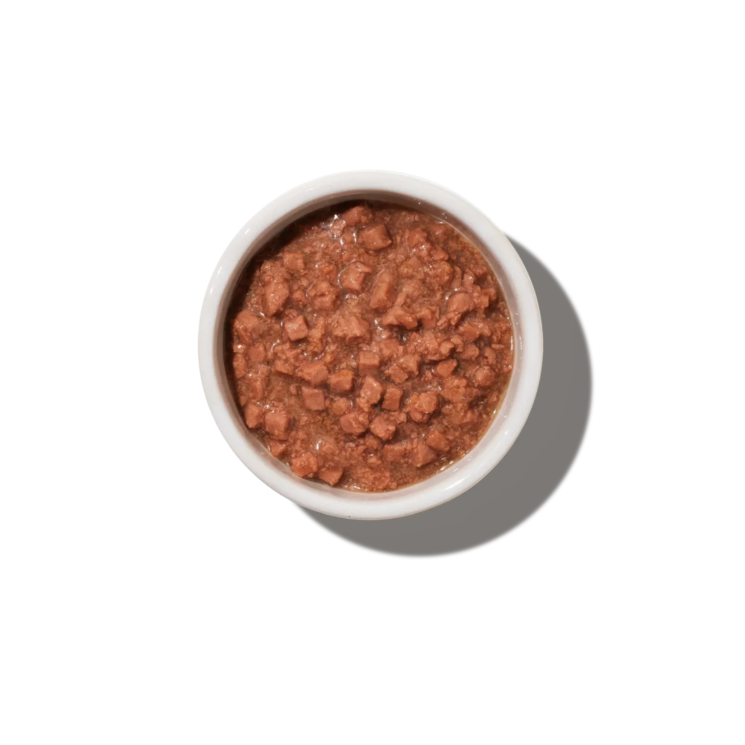 Kissan märkäruoat kastikkeessa